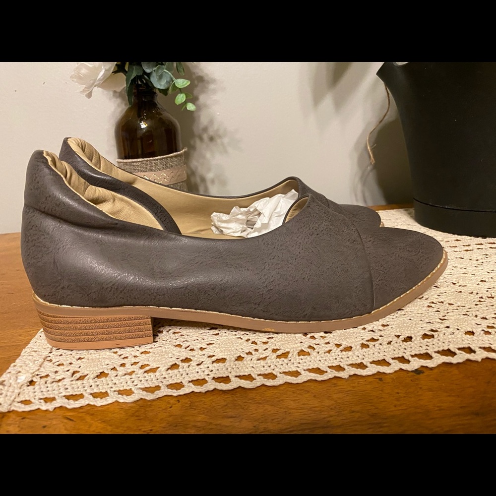 Grey flat with open side